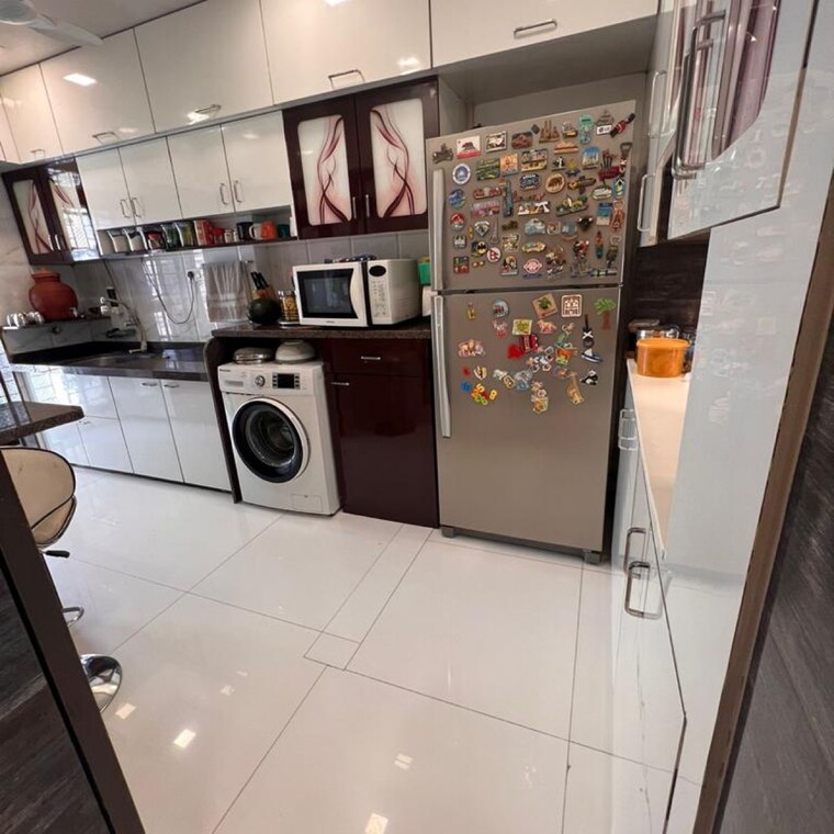 Kitchen, ballerina-apartment 3 Bedroom 1100 Sq.Ft. Apartment In Lokhandwala Complex Mumbai 9293794