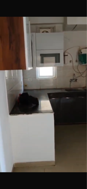 Kitchen in 2 BHK Apartment at Ajnara Homes, Sector 16 Greater Noida – for Sale
