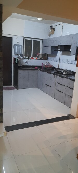 Kitchen in 2 BHK Apartment at Adavait Residency, Dattawadi – for Sale