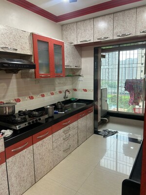 Kitchen in 3 BHK Apartment at Rustomjee OZone, Goregaon West – for Rent