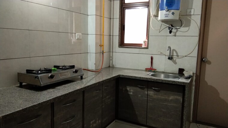 Kitchen, south bopal 3 Bedroom 1550 Sq.Ft. Apartment In South Bopal Ahmedabad 9293981