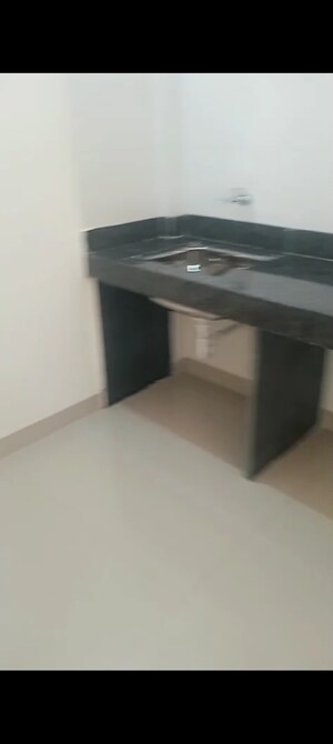 Kitchen in 1 BHK Apartment at Kusum Kunj Shewalwadi, Shewalwadi – for Sale