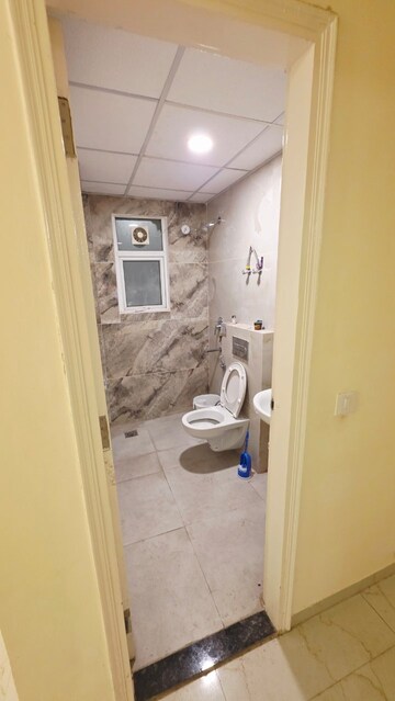 Bathroom in 3 BHK Apartment at Omaxe The Palace, Gomti Nagar – for Rent