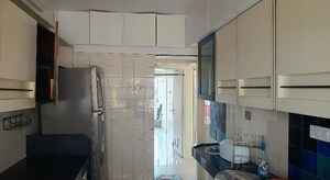 Kitchen in 2 BHK Apartment at Saibaba Tower, Andheri West – for Rent