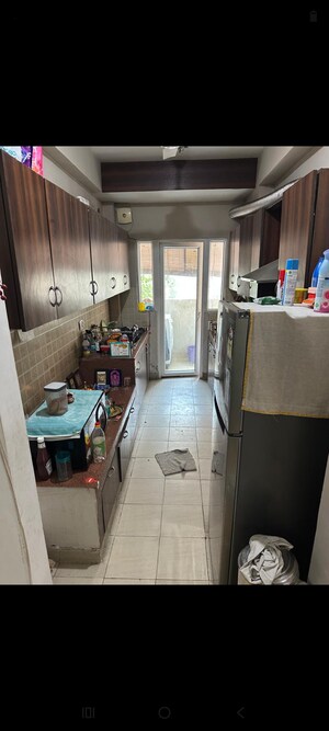 Kitchen in 3.5 BHK Apartment at Mahagun Moderne, Sector 78 – for Rent