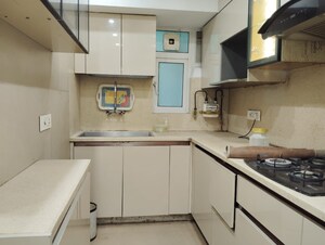 Kitchen in 2.5 BHK Apartment at Triveni Apartments CGHS, Paschim Vihar – for Rent