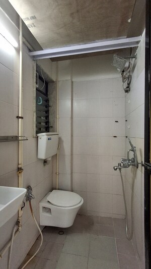 Team Area in 1 BHK Apartment at Evershine Millennium Paradise, Kandivali East – for Rent