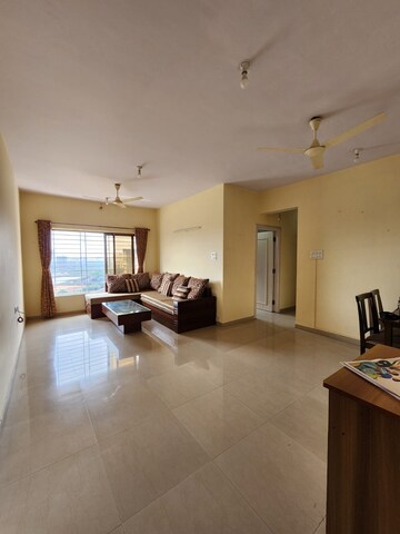 Living Room in 2 BHK Apartment at Raheja Willows, Kandivali East – for Sale