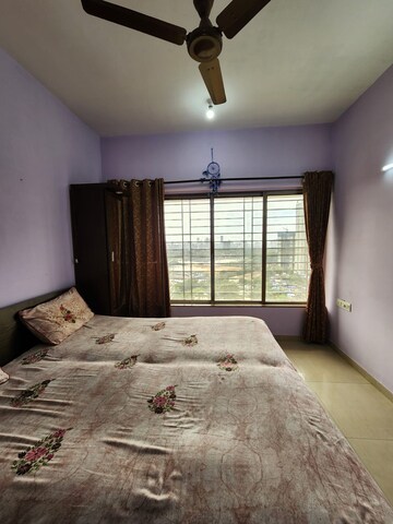 Bedroom in 2 BHK Apartment at Raheja Willows, Kandivali East – for Sale