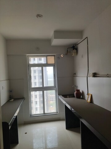 Kitchen in 2 BHK Apartment at Godrej Emerald, Ghodbunder Road – for Sale