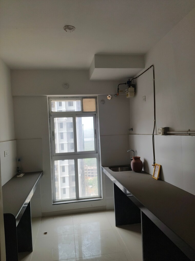 Kitchen, godrej-emerald 2 Bedroom 750 Sq.Ft. Apartment In Ghodbunder Road Thane 9294263