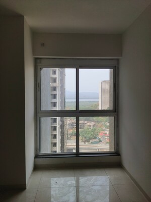 Room in 2 BHK Apartment at Godrej Emerald, Ghodbunder Road – for Sale