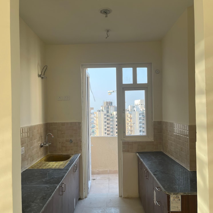 Kitchen, amrapali-heartbeat-city 2.5 Bedroom 1195 Sq.Ft. Apartment In Sector 107 Noida 9294336