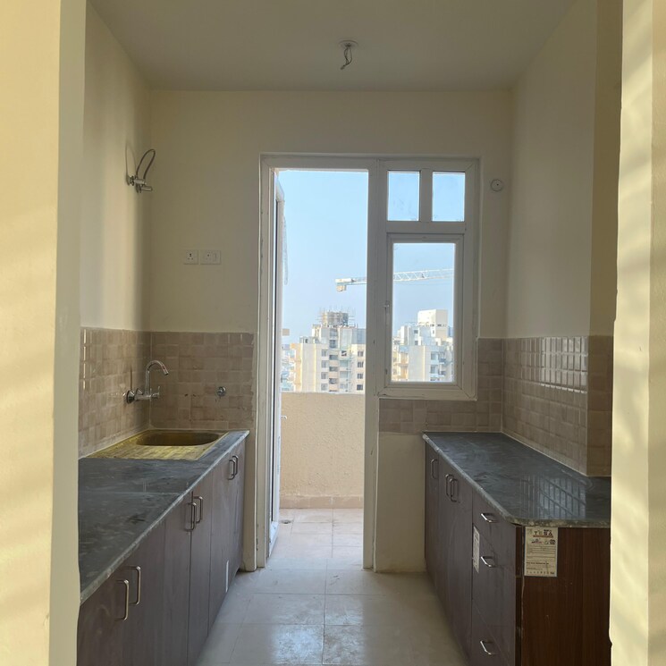 Kitchen, amrapali-heartbeat-city 2.5 Bedroom 1195 Sq.Ft. Apartment In Sector 107 Noida 9294336
