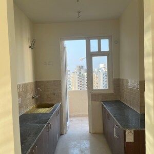 Kitchen in 2.5 BHK Apartment at Amrapali Heartbeat City, Sector 107 – for Rent