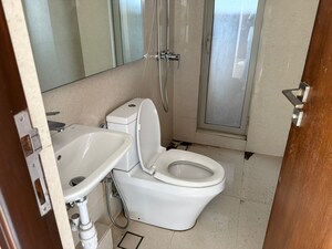 Bathroom in 2 BHK Apartment at Shree Vrushti, Ghodbunder Road – for Rent