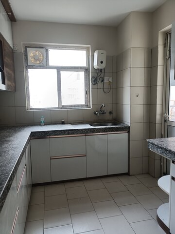 Kitchen in 4 BHK Apartment at The 3C Lotus Panache, Sector 110 – for Sale