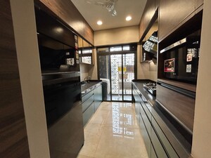 Kitchen in 2 BHK Apartment at Runwal Garden City, Balkum Pada – for Rent