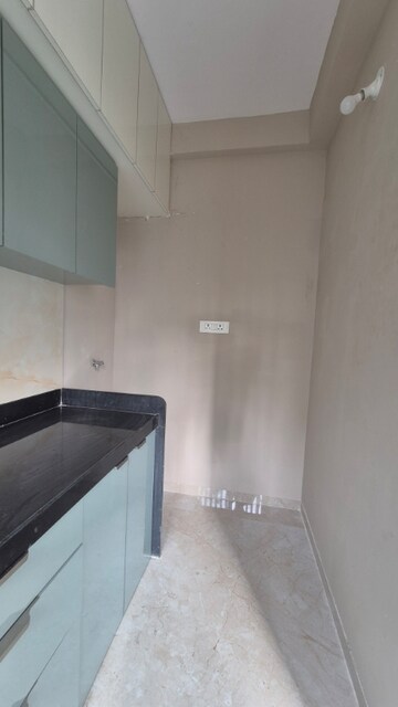 Kitchen in 1 BHK Apartment at Haware Intelligentia Axis, Borivali East – for Sale
