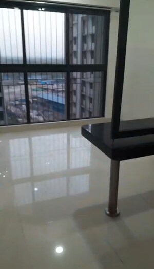 Living Room in 1 BHK Apartment at Lodha Crown Quality Homes, Majiwada – for Sale