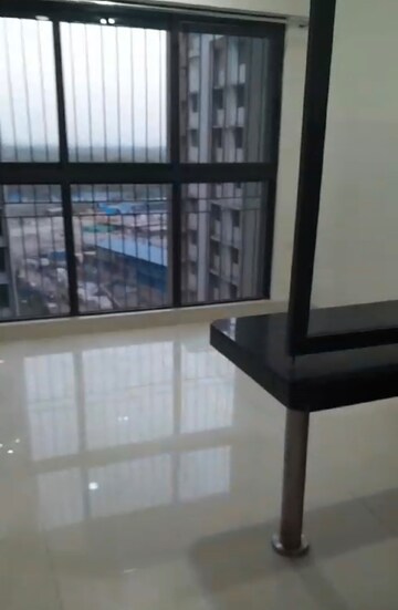 Living Room in 1 BHK Apartment at Lodha Crown Quality Homes, Majiwada – for Sale