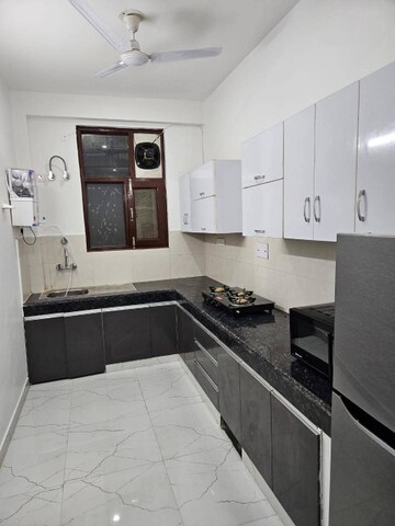 Kitchen in 2 BHK Apartment at Freedom Fighters Enclave – for Rent