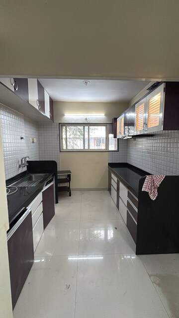 Kitchen in 2 BHK Apartment at Raheja Gardens, Wanwadi – for Rent