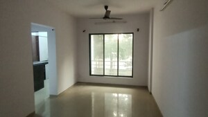 Living Room in 1 BHK Apartment at Paradigm Twinstar, Mira Road – for Sale