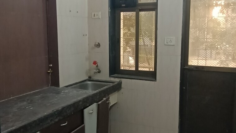 Kitchen, paradigm-twinstar 1 Bedroom 650 Sq.Ft. Apartment In Mira Road Thane 9294774