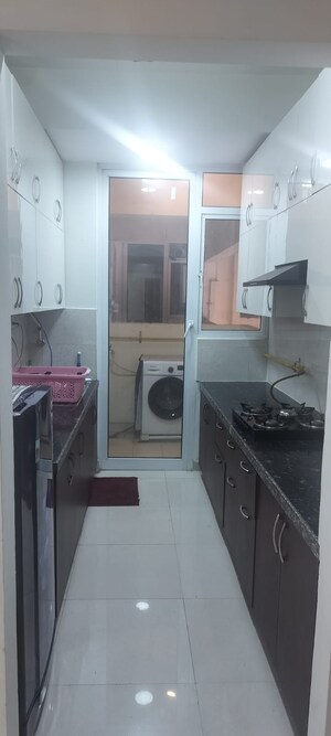 Kitchen in 2 BHK Apartment at Mahagun Mirabella, Sector 79 – for Rent