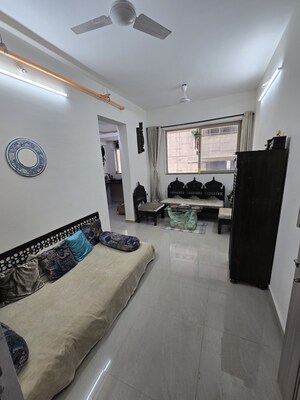 Living Room in 1 BHK Apartment at Bhoomi SRA CHS, Goregaon East – for Rent