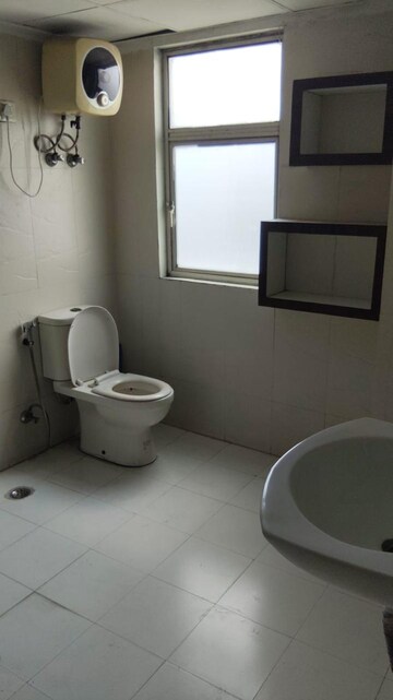 Bathroom in 3 BHK Apartment at Gaur Sportswood, Sector 79 – for Rent