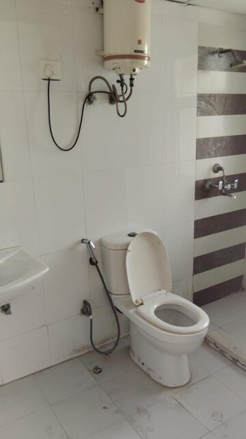 Bathroom in 3 BHK Apartment at Gaur Sportswood, Sector 79 – for Rent