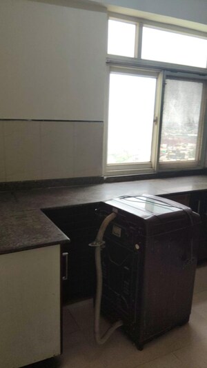 Kitchen in 3 BHK Apartment at Gaur Sportswood, Sector 79 – for Rent