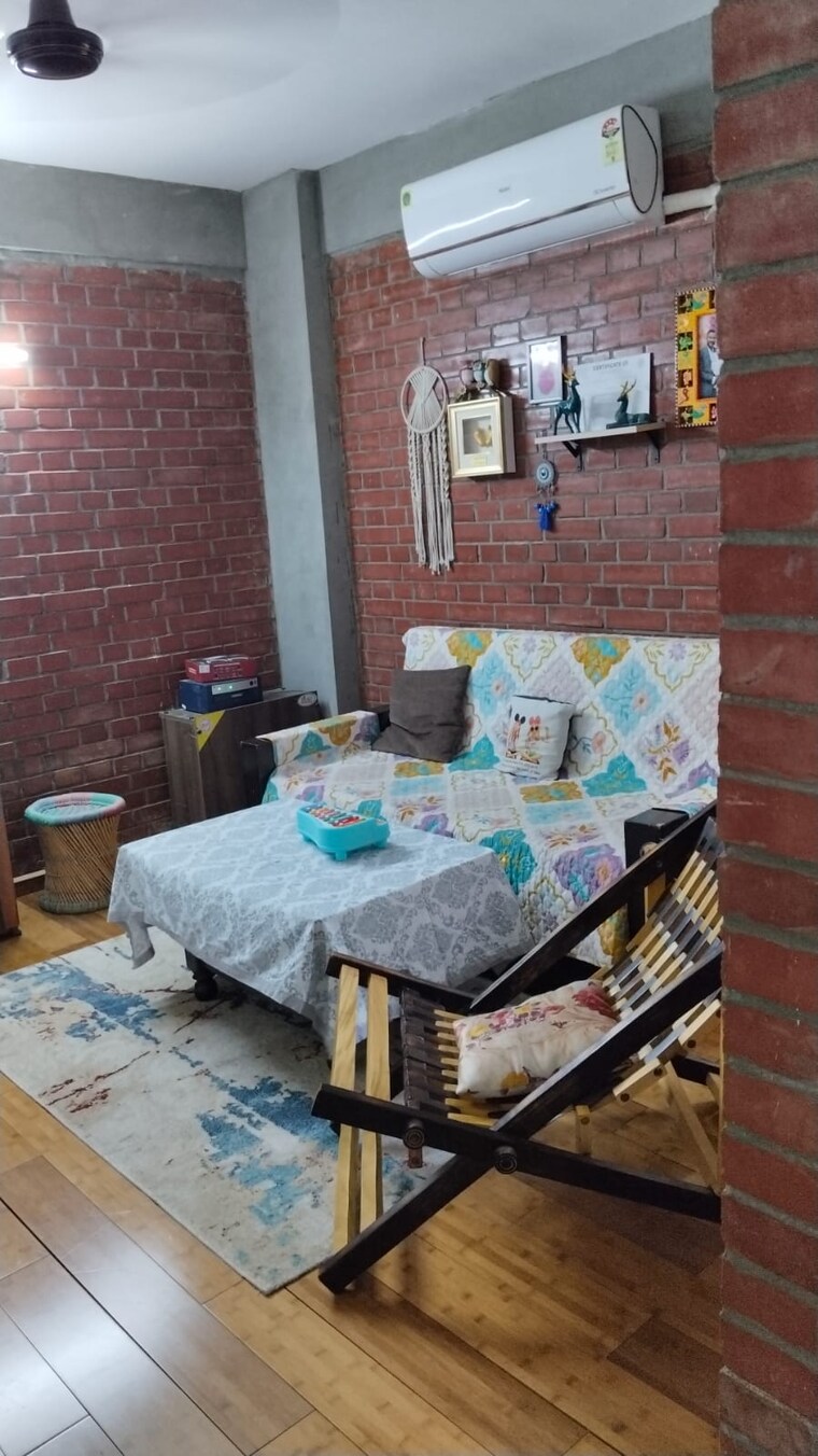 Living Room, arete-india-our-homes-3 2 Bedroom 629 Sq.Ft. Apartment In Sohna Sector 6 Gurgaon 9294877