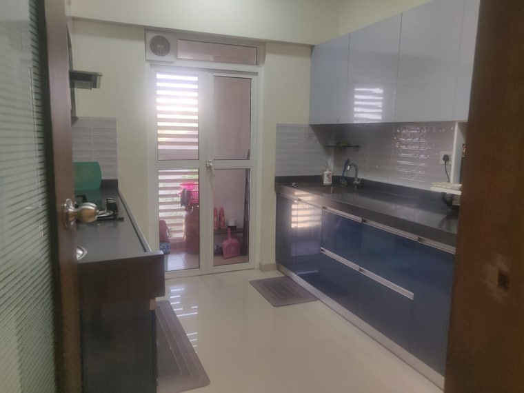 Kitchen, lodha-belmondo 2 Bedroom 1010 Sq.Ft. Apartment In Gahunje Pune 9294874