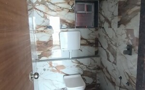 Bathroom in 2 BHK Apartment at Shree Nidhi Heights, Mira Road – for Rent