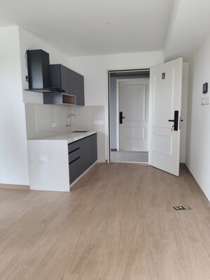 Kitchen in Studio Apartment at Gera World of Joy, Kharadi – for Rent