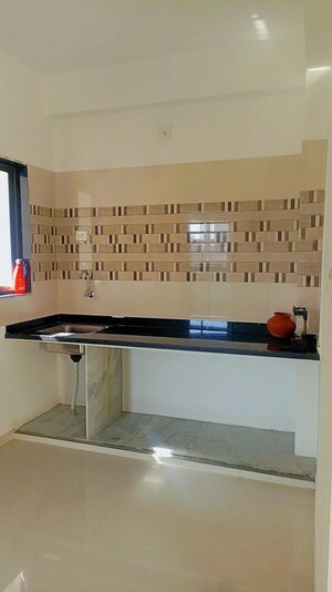 Kitchen in 2 BHK Apartment at Omnium Royal, Nana Chiloda – for Rent