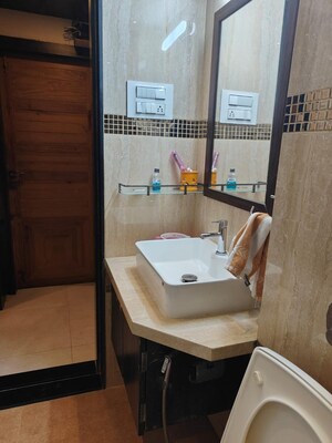 Bathroom in 2 BHK Apartment at Woodland Apartment, Andheri West – for Rent