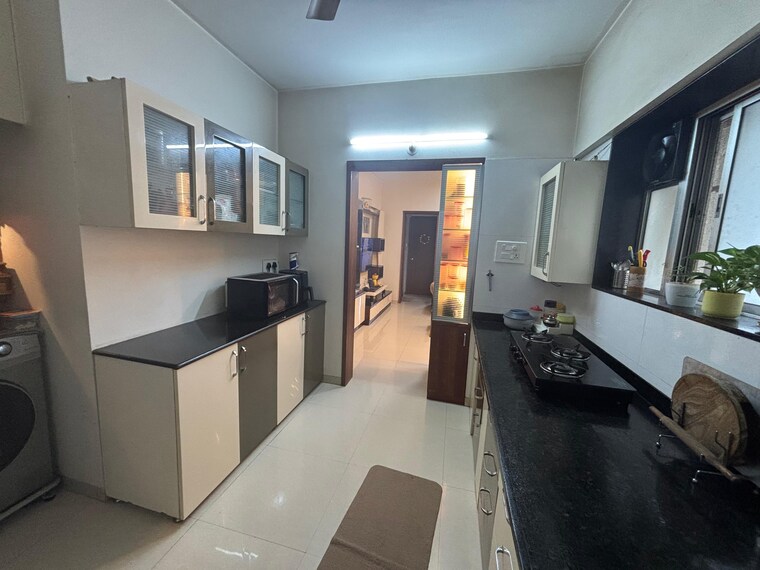 Kitchen, axis-paradigm-whistling-meadows 2 Bedroom 1000 Sq.Ft. Apartment In Paud Road Pune 9294909