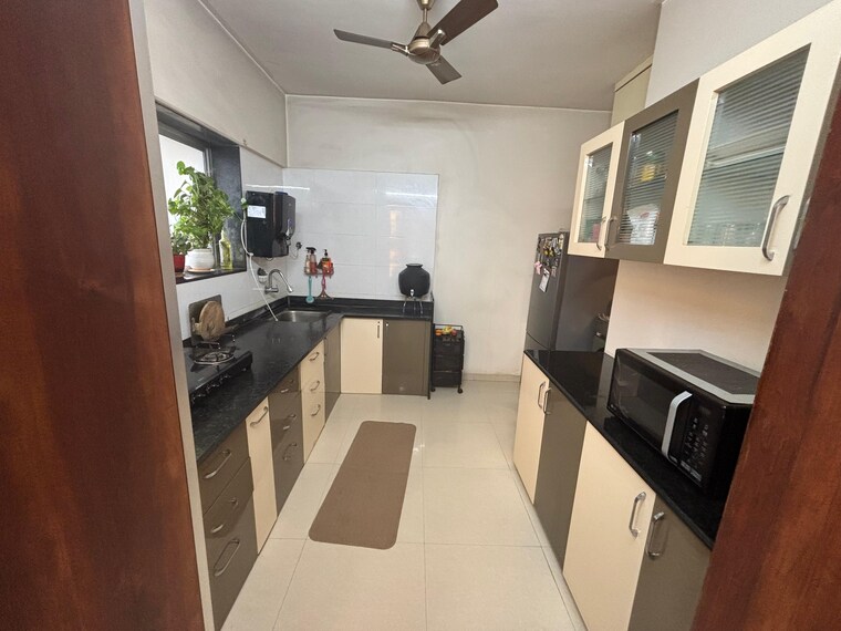 Kitchen, axis-paradigm-whistling-meadows 2 Bedroom 1000 Sq.Ft. Apartment In Paud Road Pune 9294909