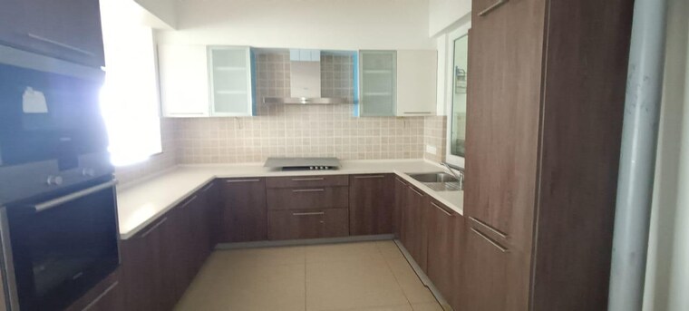 Kitchen, brigade-caladium 3 Bedroom 3450 Sq.Ft. Apartment In Hebbal Bangalore 9295124