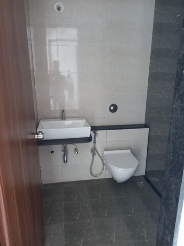 Bathroom in 3 BHK Apartment at Mantra Mirari, Koregaon Park – for Rent