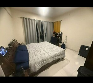 Bedroom in 2 BHK Apartment at Maurya CHS, Sangamvadi – for Rent