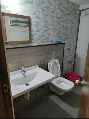 Bathroom in 2 BHK Apartment at Maurya CHS, Sangamvadi – for Rent