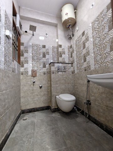 Bathroom in 3 BHK Builder Floor at Khirki Extension – for Rent