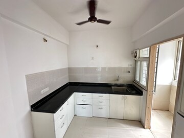 Kitchen in 3 BHK Apartment at Gera World of Joy, Kharadi – for Rent