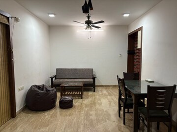 Living Room in 2 BHK Apartment at Marvel Fria, Wagholi – for Rent