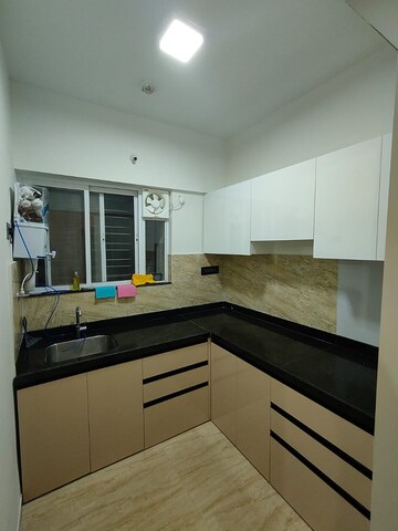 Kitchen in 2 BHK Apartment at Amanora Gold Towers, Hadapsar – for Sale